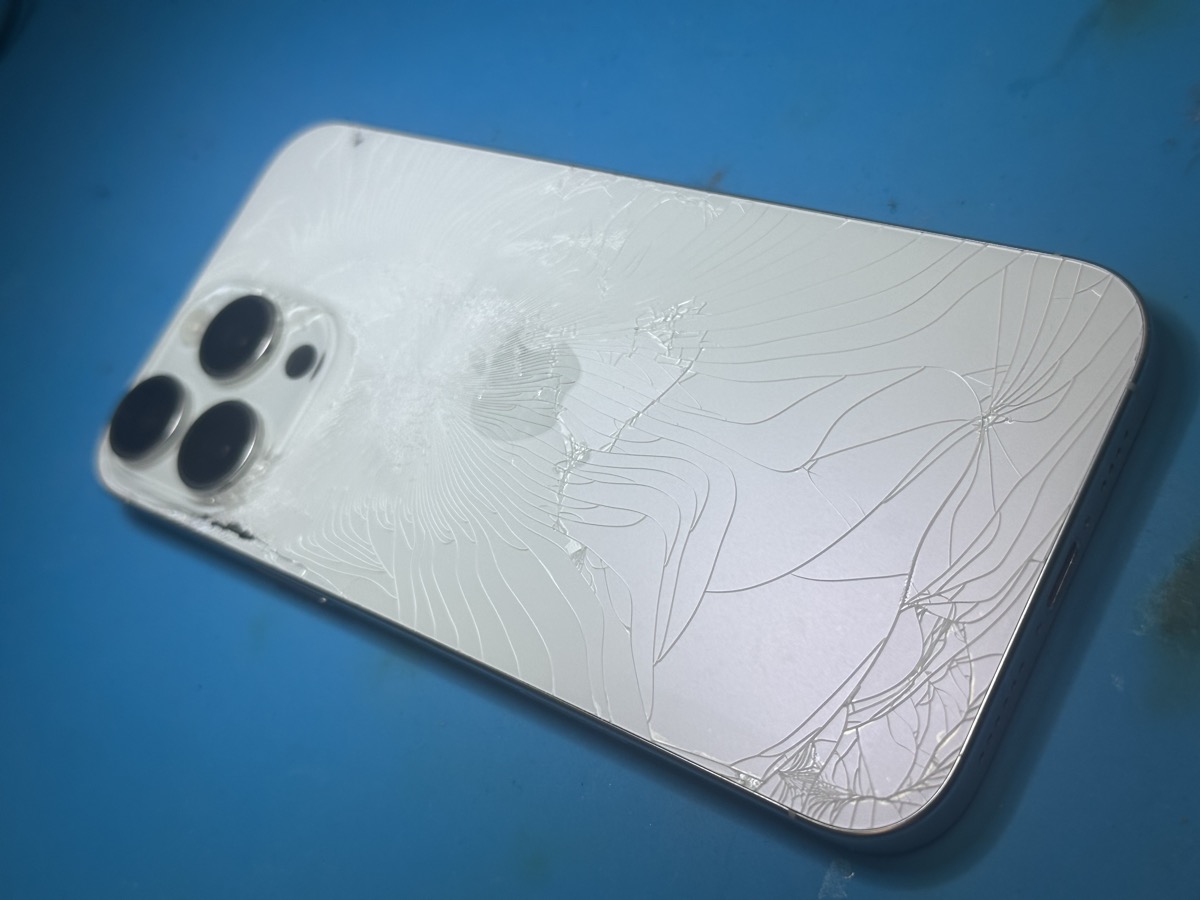 iPhone 16 Pro Max shattered back glass before repair Marietta GA