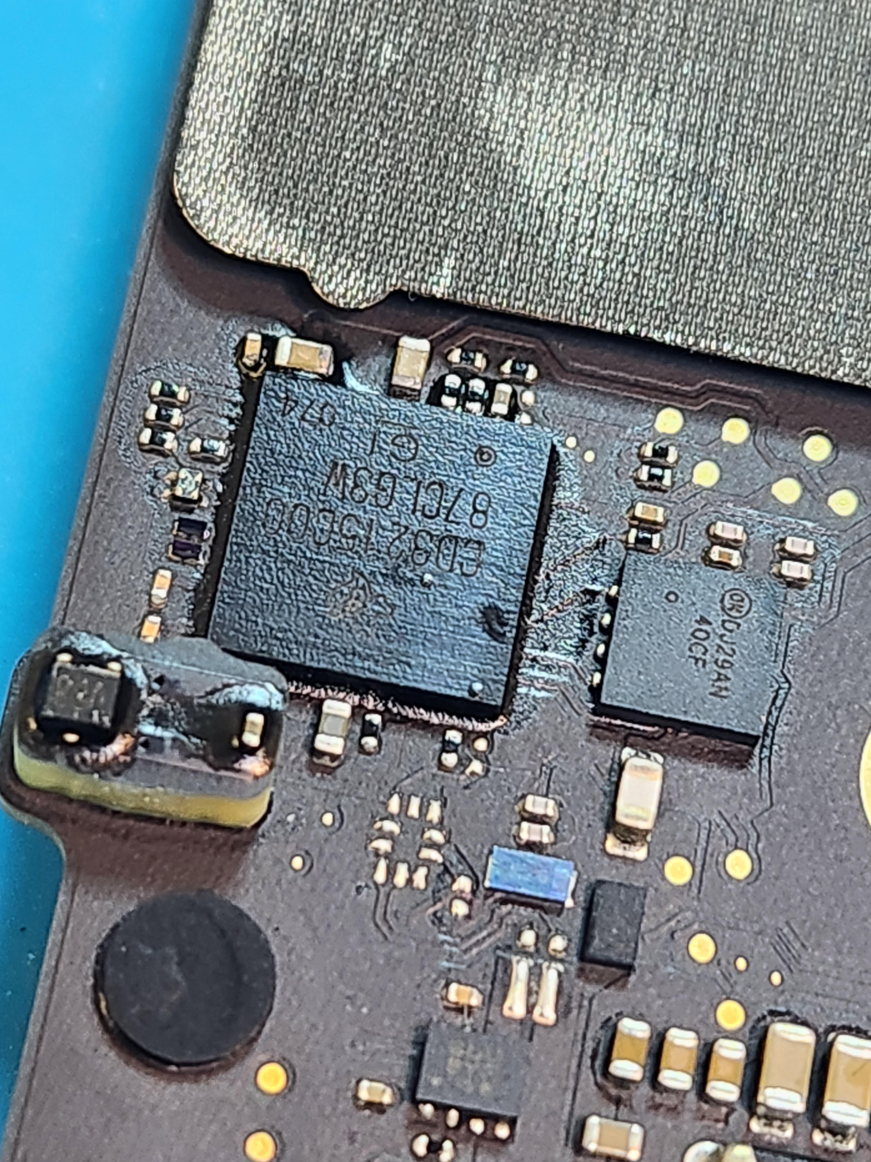 MacBook logic board after professional liquid damage treatment at The Mac Space